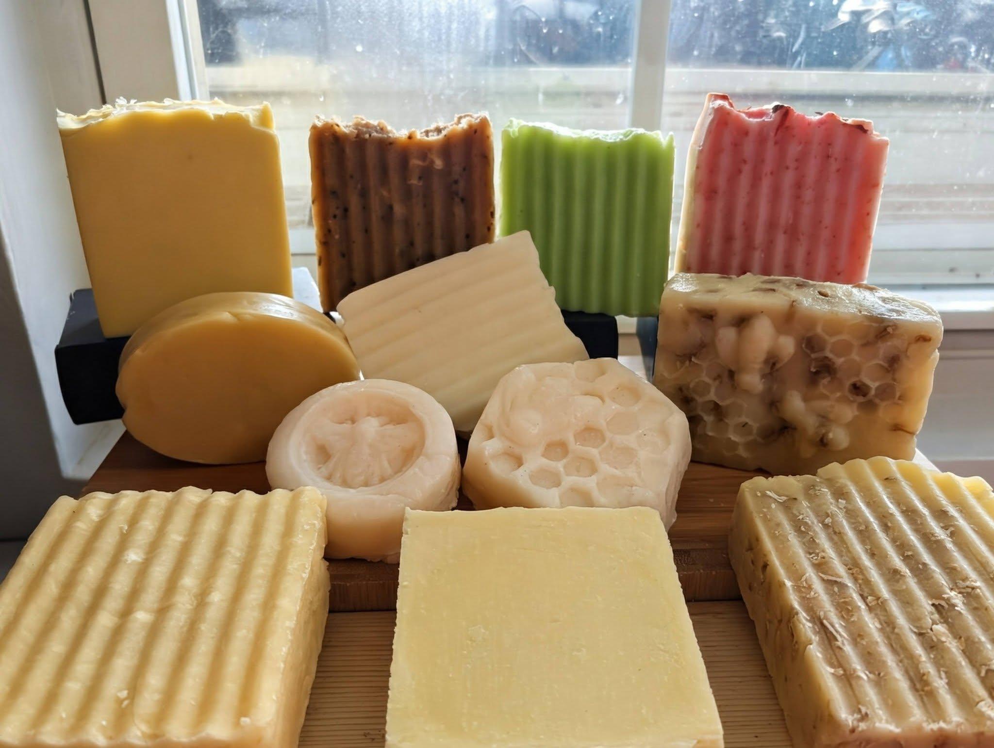 Stack of handmade soap bars in window light